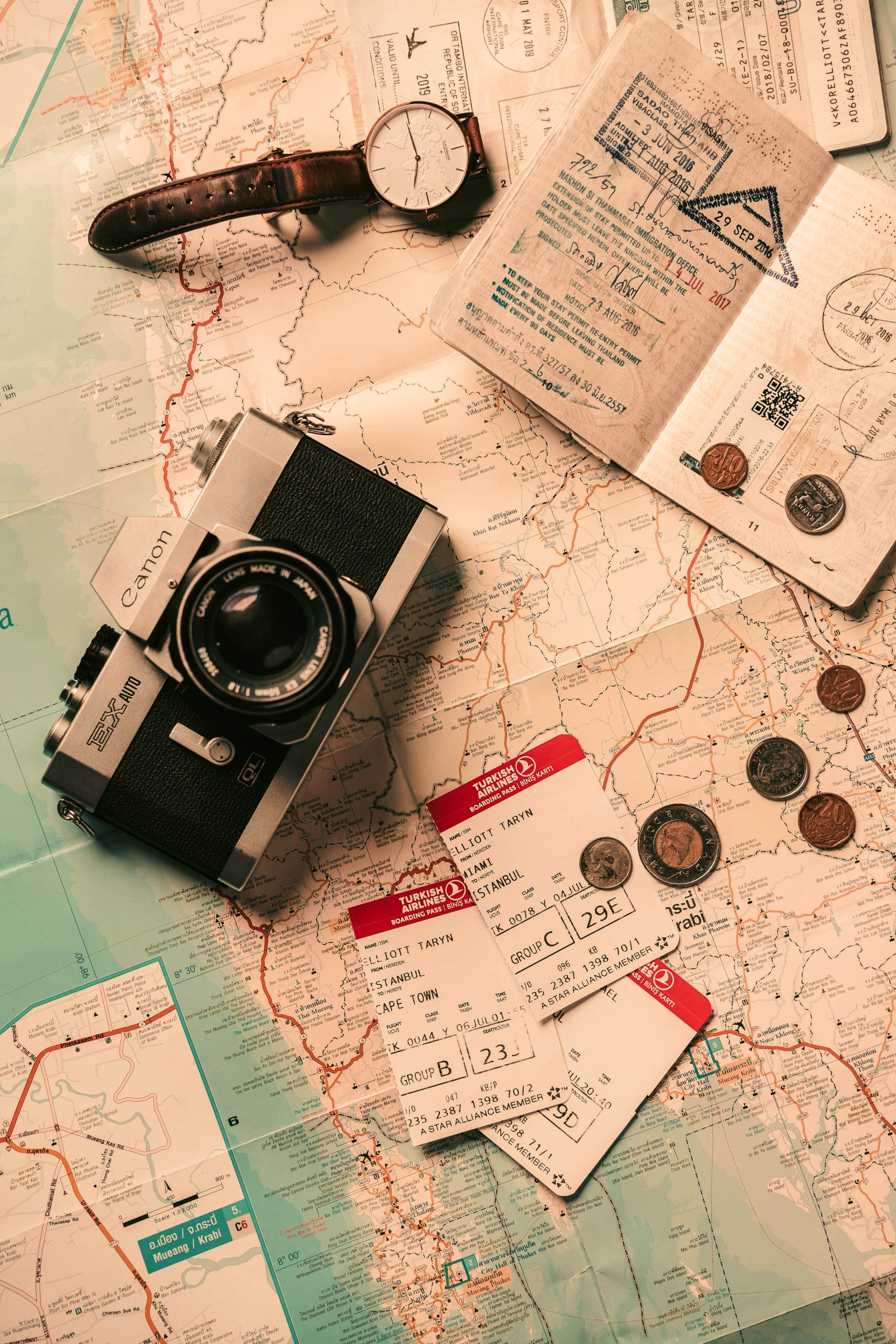 Photo of Map with Coins and Camera