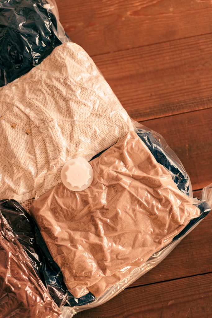 10 Essential Travel Gadgets for Long-Term Travel Vacuum bag with clothes