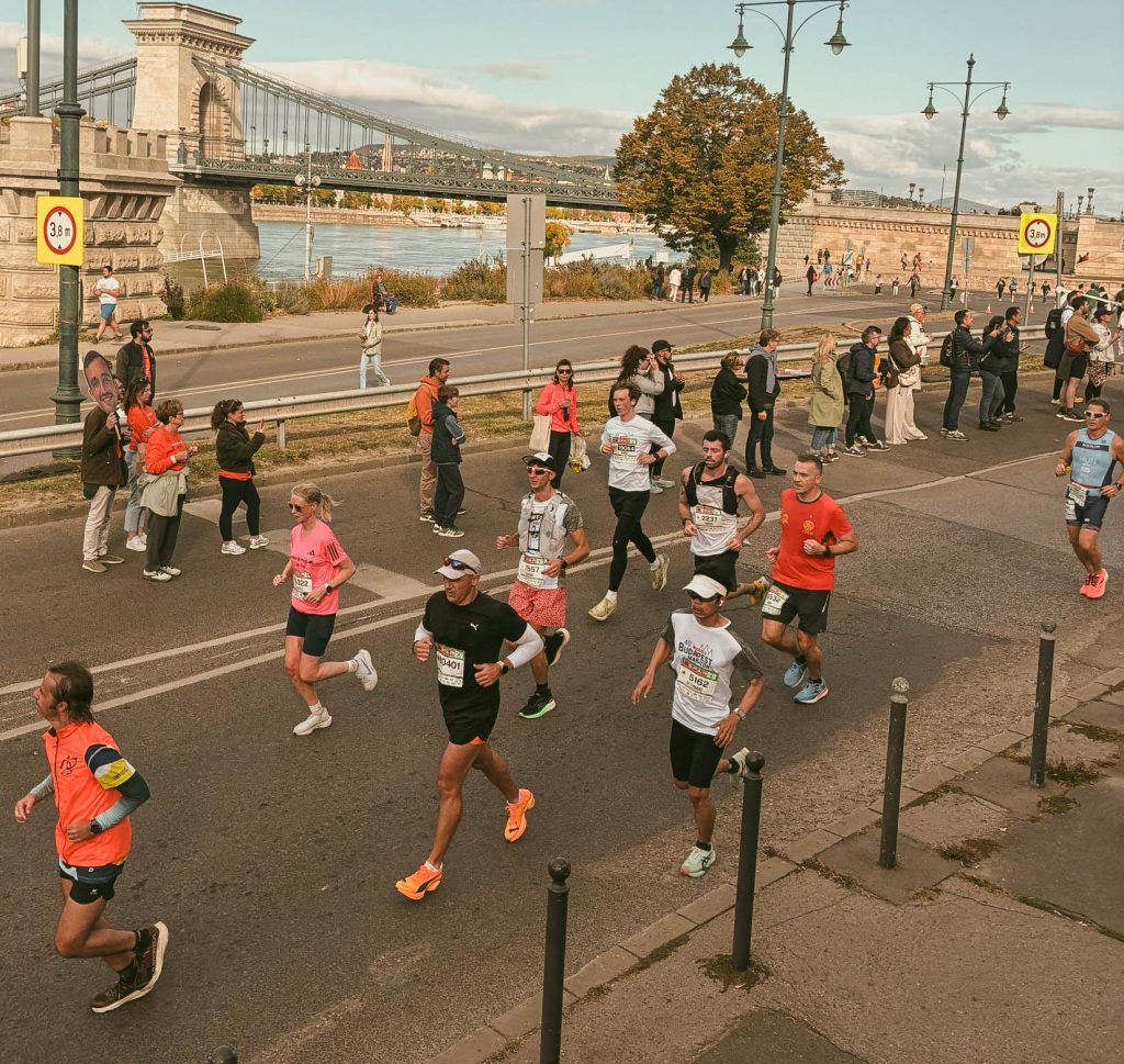 Weekend in Budapest - Itinerary and Guide Budapest Marathon Runners along Danube River