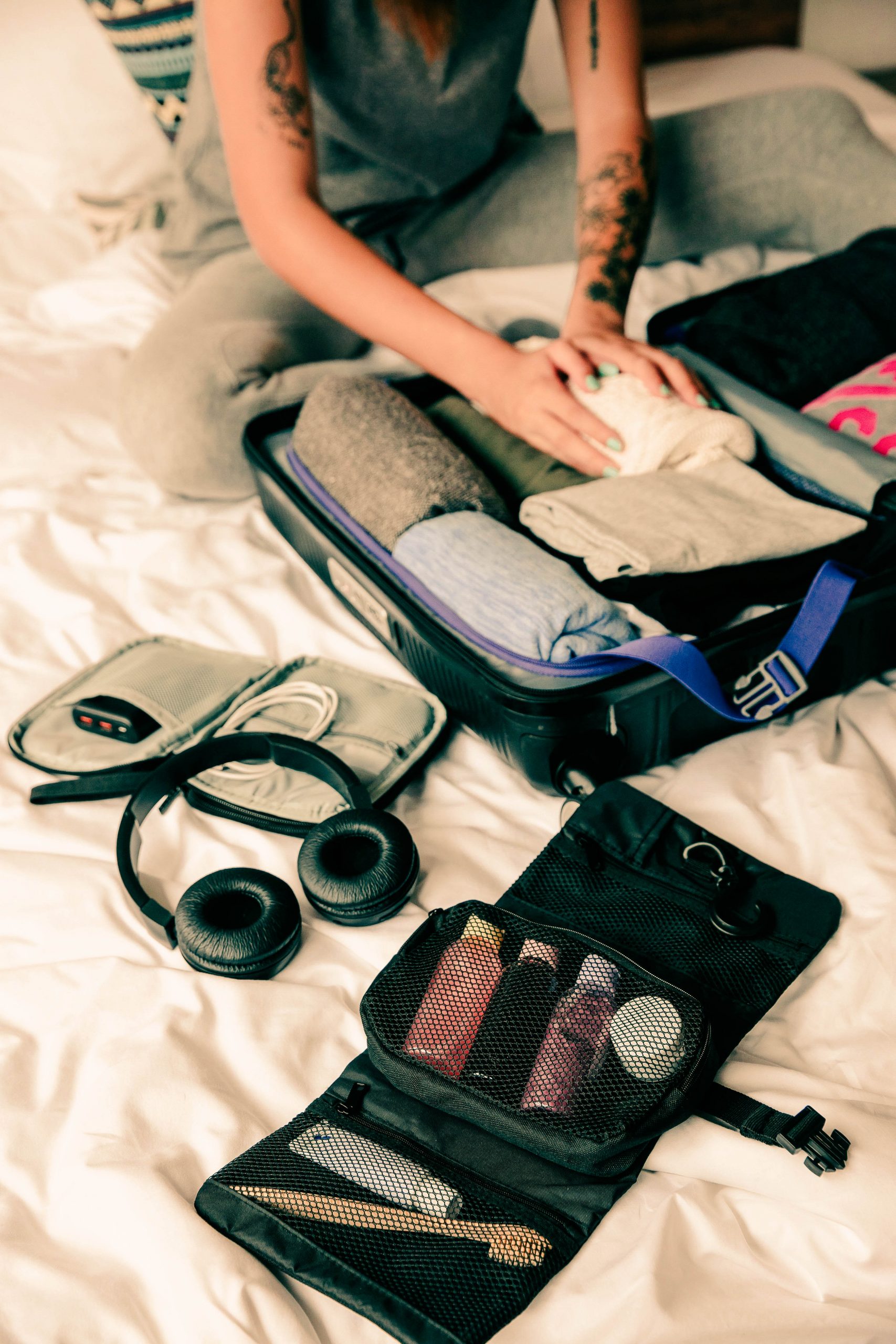 Woman packing suitcase