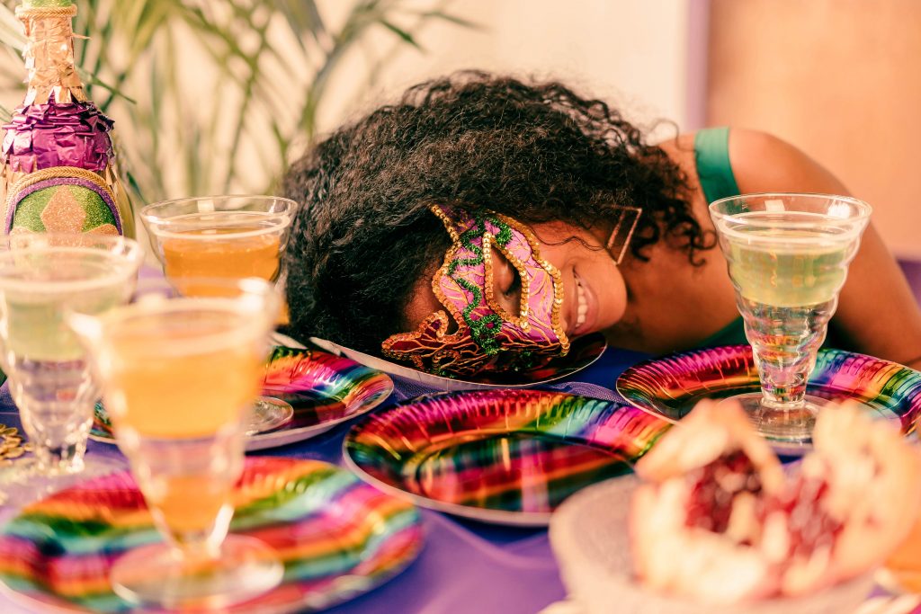 woman sleeping in party mask