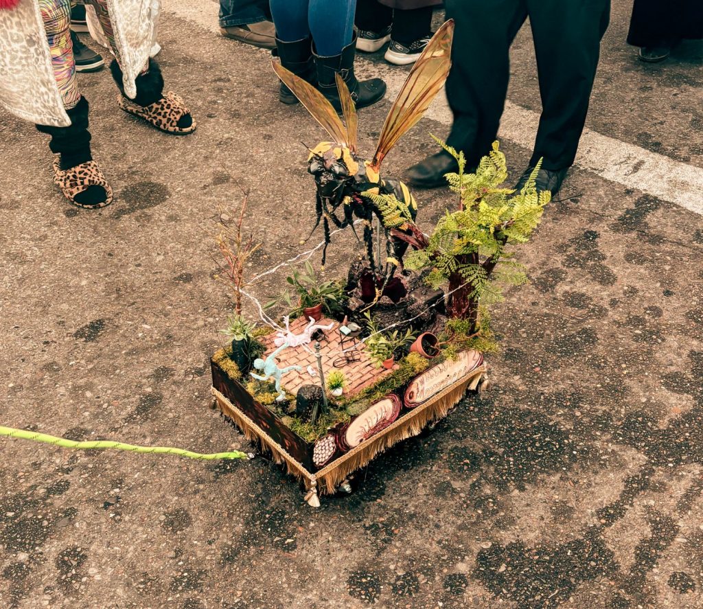 elle atlas travel nola parade tit rex original 1