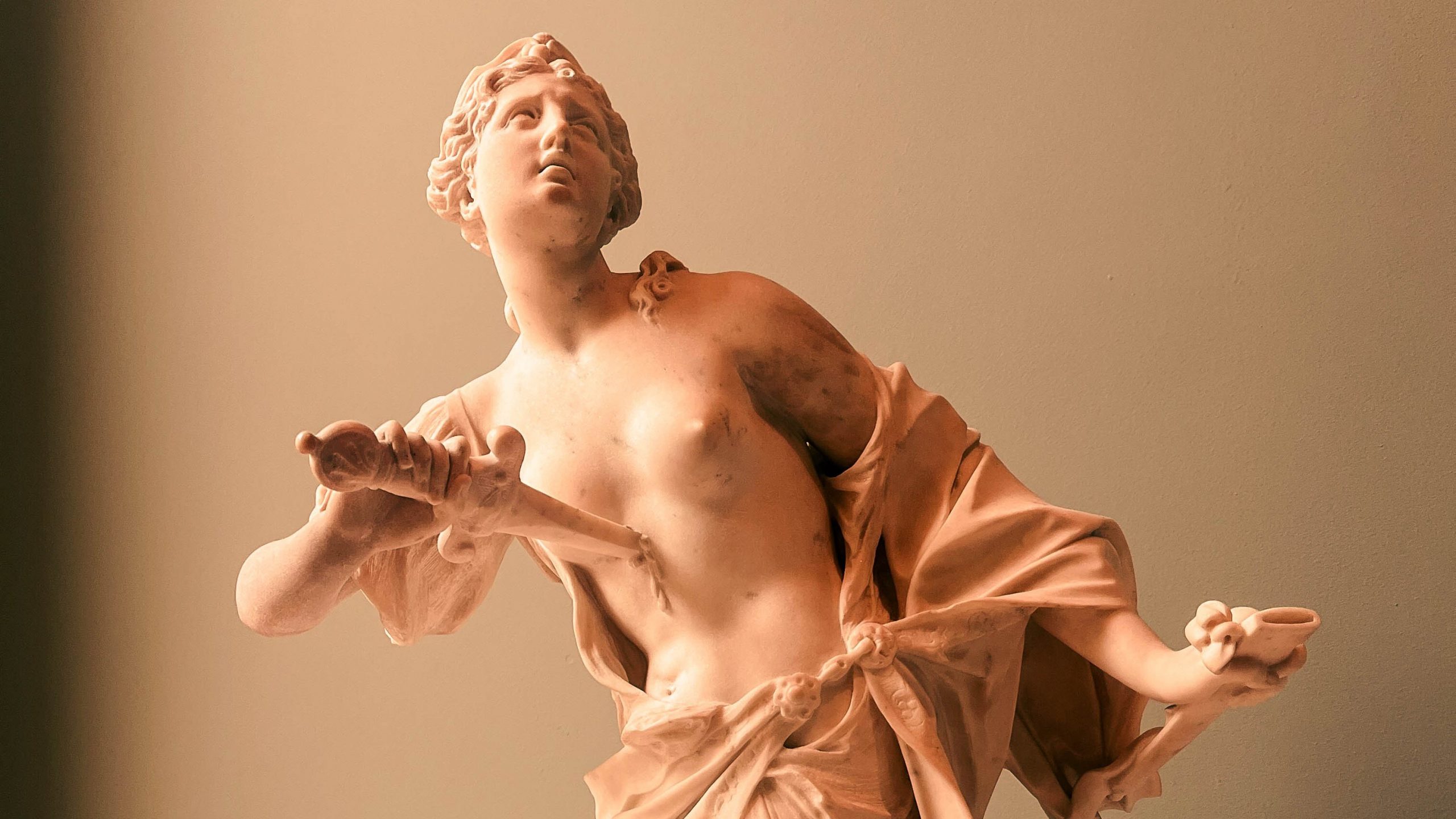 7 Affordable Things to Do Solo in Paris photo of sculpture at the Louvre