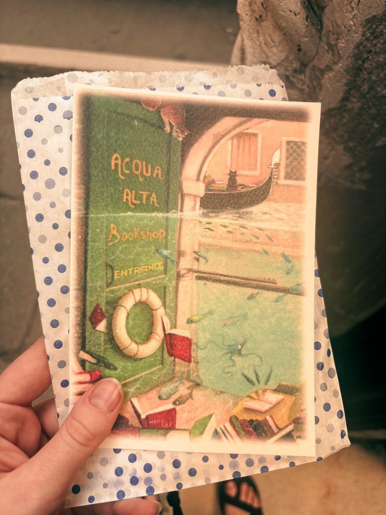 The Ultimate Venice Travel Guide photo of libreria postcard